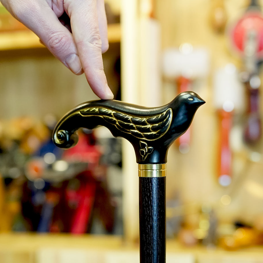Canne de marche élégante en bois noir motif Hirondelle