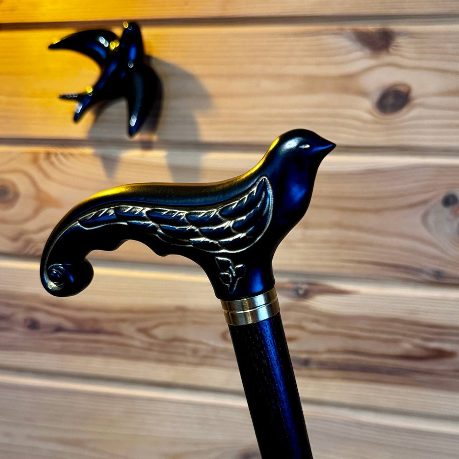 Canne de marche élégante en bois noir motif Hirondelle