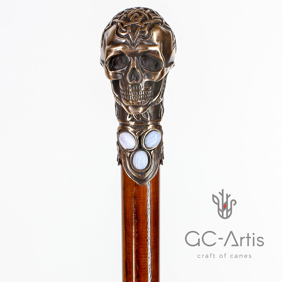 Pommeau de canne en forme de crâne en bronze