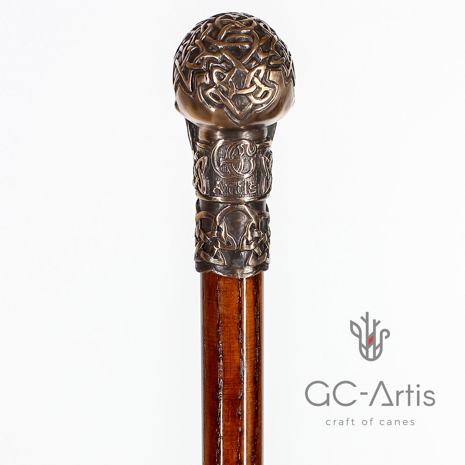 Pommeau de canne en forme de crâne en bronze